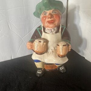 Wedgwood Figurine with Green Hat and Brown Coat